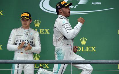 Confusão com Rosberg (à esq.) marcou o título de Hamilton.