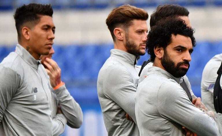 Os jogadores do Liverpool se preparam para o jogo contra a Roma.
