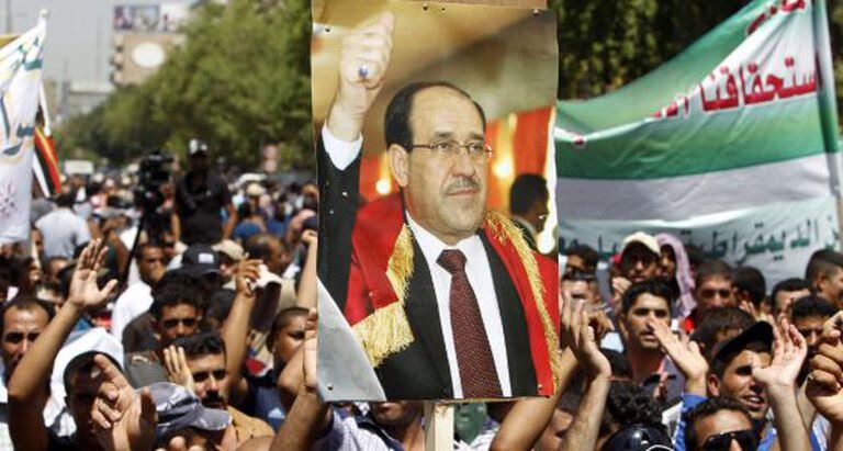 Vários manifestantes de Nuri al Maliki.