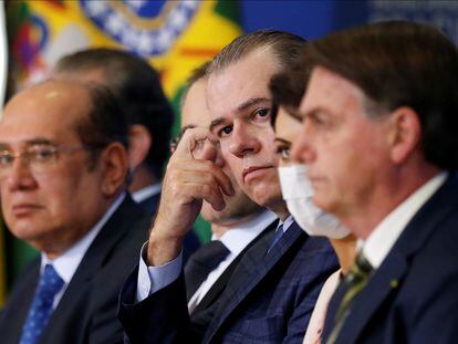 Os magistrados do STF Gilmar Mendes e Toffoli na posse de novos ministros de Bolsonaro (em primeiro plano).