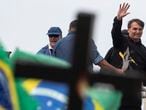 Brazil's President Jair Bolsoanro waves at supporters after a motorcycle tour in Rio de Janeiro, Brazil, Sunday, May 23, 2021. (AP Photo/Bruna Prado)