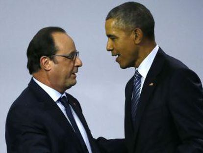 Hollande (esquerda) e Barack Obama na COP21.