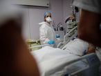Medical staff members work in the Intensive Care Unit (ICU) where patients suffering from the coronavirus disease (COVID-19) are treated at Ambroise Pare clinic in Neuilly-sur-Seine, near Paris, France, November 12, 2020. REUTERS/Benoit Tessier