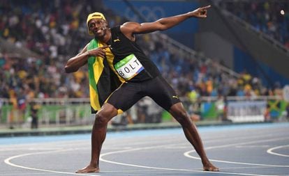 Usain Bolt celebra vitória.