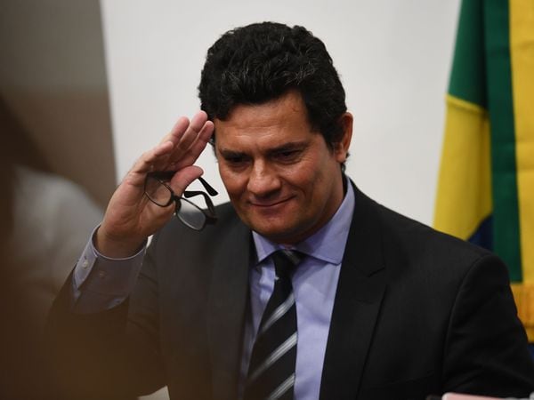Brazilian Minister of Justice and Public Security, Sergio Moro, gestures after a press conference at Minister of Justice, in Brasilia, on April 24, 2020. - Brazilian Minister of Justice and Public Security, Sergio Moro, announce his resignation on Friday after Brazilian President Jair Bolsonaro dismissed the head of the Brazilian Federal Police. (Photo by EVARISTO SA / AFP)