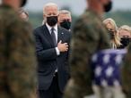 President Joe Biden and first lady Jill Biden watch as a carry team moves a transfer case containing the remains of Marine Corps Cpl. Humberto A. Sanchez, 22, of Logansport, Ind., during a casualty return Sunday, Aug. 29, 2021, at Dover Air Force Base, Del. According to the Department of Defense, Sanchez died in an attack at Afghanistan's Kabul airport, along with 12 other U.S. service members. (AP Photo/Carolyn Kaster)