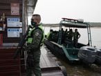 Police and health agents, notify a floating house, located on the Negro River in Manaus, which operates illegally during the operation to comply with the state decree that closes bars, nightclubs and beaches, due to the increase in new cases of contamination by the Corona Virus in Manaus, Amazonas, Brazil. Bruno Kelly / El Pais.