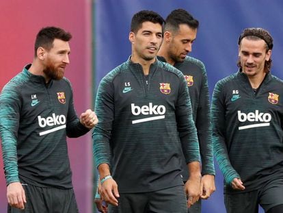 Messi, Suárez, Busquets e Griezmann no treino.