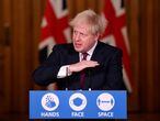 Britain's Prime Minister Boris Johnson speaks during a news conference in response to the ongoing situation with the coronavirus disease (COVID-19) pandemic, inside 10 Downing Street, London ,Britain, December 19, 2020. REUTERS/Toby Melville/Pool