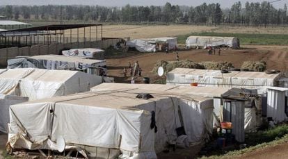 Refugiados sírios na fronteira com Líbano em 19 de junho.