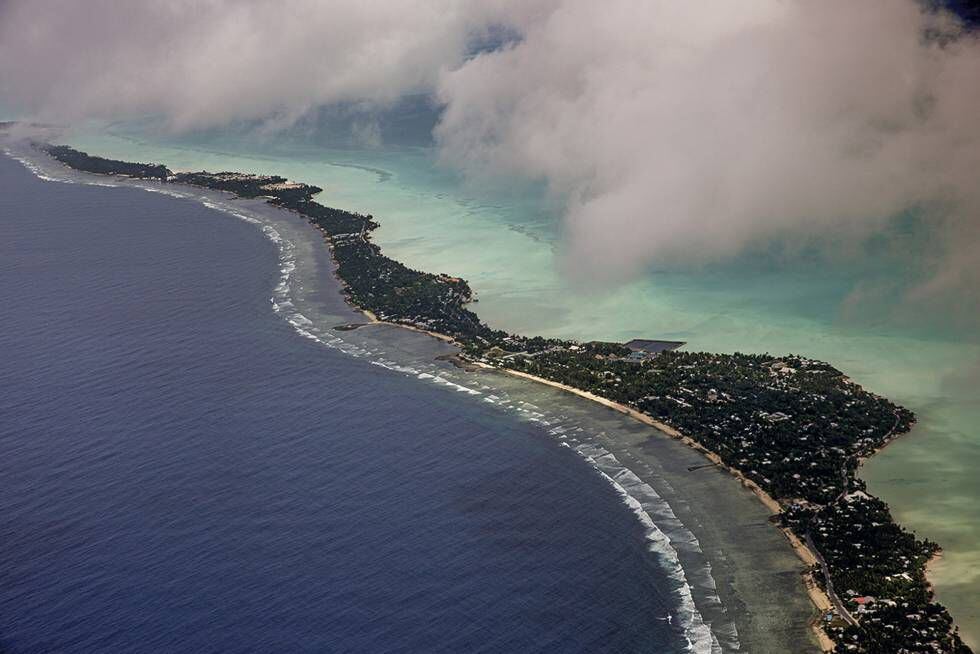 <b>Kiribati.</b>Vista aérea do arquipélago do Pacífico em risco de desaparecimento pela ascensão do nível do mar.