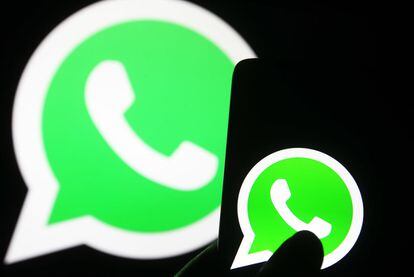 In this photo illustration a WhatsApp logo seen on a