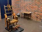 FILE - This March 2019, file photo, provided by the South Carolina Department of Corrections shows the state's electric chair in Columbia, S.C. South Carolina House members may soon debate whether to restart the state's stalled death penalty with the electric chair and whether to add a firing squad to the execution methods. The state's House Judiciary Committee approved a bill Tuesday, April 27, 2021, that would let condemned inmates choose death by being shot in the heart by several sharpshooters.  (Kinard Lisbon/South Carolina Department of Corrections via AP, File)