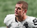 FILE - In this Nov. 29, 2020, file photo, Las Vegas Raiders defensive end Carl Nassib leaves the field after an NFL football game against the Atlanta Falcons in Atlanta. Nassib on Monday, June 21, 2021, became the first active NFL player to come out as gay. Nassib announced the news on Instagram, saying he was not doing it for the attention but because “I just think that representation and visibility are so important.” (AP Photo/John Bazemore, File)