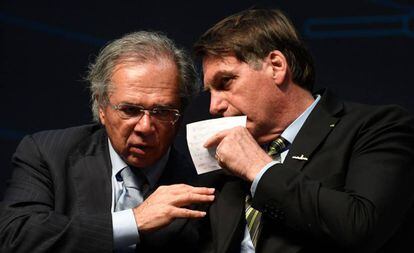 O ministro Paulo Guedes e o presidente Jair Bolsonaro, no dia 11, no Rio.