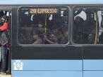 Passengers travel on a public bus amid the coronavirus disease (COVID-19) outbreak in Rio de Janeiro, Brazil March 5, 2021. REUTERS/Ricardo Moraes