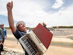 Brazil's President Jair Bolsonaro plays an accordion during a visit to works on water infrastructure in Sertania, Pernambuco state, Brazil, February 19, 2021. Alan Santos/Brazilian Presidency/Handout via REUTERS  THIS IMAGE HAS BEEN SUPPLIED BY A THIRD PARTY. MANDATORY CREDIT