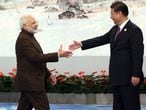 El primer ministro indio, Narendra Modi, saluda al presidente chino Xi Jinping el 4 de septiembre de 2017 en Xiamen, China.