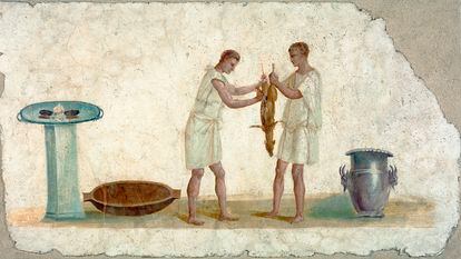 Fragmento de um afresco romano do século II, conservado no Museu Getty, na Califórnia, que mostra dois escravos destripando um animal.