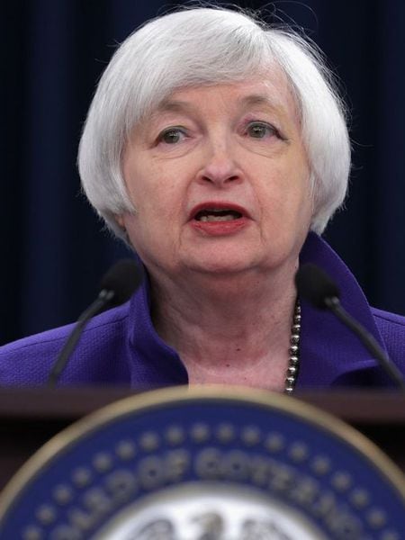 Janet Yellen, presidenta do Fed, anuncia a alta de juros.