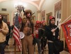 TOPSHOT - Supporters of US President Donald Trump enter the US Capitol on January 6, 2021, in Washington, DC. - Demonstrators breeched security and entered the Capitol as Congress debated the a 2020 presidential election Electoral Vote Certification. (Photo by Saul LOEB / AFP)