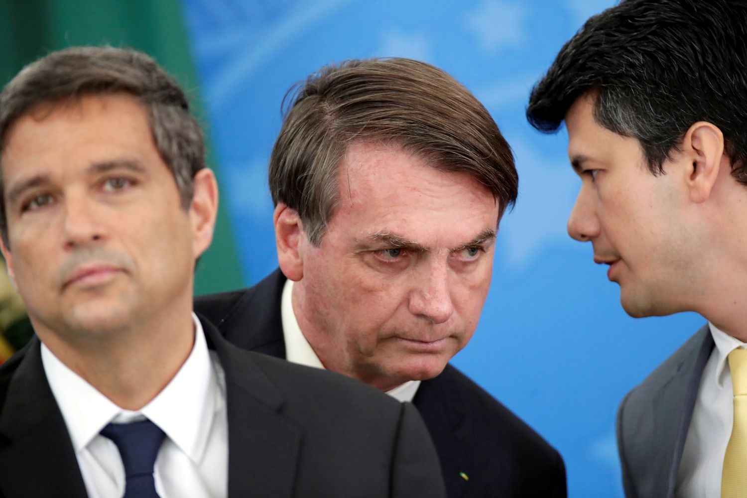 Presidente do Banco Central, Roberto Campos Netos, Jair Bolsonaro, e o presidente do BNDES, Gustavo Montezano durante o anúncio em Brasília.