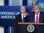 (FILES) In this file photo taken on April 16, 2020, US President Donald Trump flanked by US Vice President Mike Pence, speaks during the daily briefing on Covid-19, in the Brady Briefing Room of the White House in Washington, DC. - Pence tested negative on October 2, 2020, for Covid-19, his spokesman said after President Donald Trump announced he and First Lady Melania Trump had contracted the coronavirus. "As has been routine for months, Vice President Pence is tested for Covid-19 every day. This morning, Vice President Pence and the Second Lady tested negative for Covid-19," spokesman Devin O'Malley tweeted. (Photo by MANDEL NGAN / AFP)