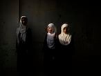 Nabila, 16, center, and Ayena, 18, at the Marshal Dostum School, where over two dozen girls from Darzab and Qosh Tepa districts study, in Sheberghan, Afghanistan, May 5, 2021. Two districts in Afghanistan's northwest offer a glimpse into life under the Taliban, who have completely cut off education for teenage girls.,Image: 611219994, License: Rights-managed, Restrictions: , Model Release: no, Credit line: KIANA HAYERI / New York Times / ContactoPhoto