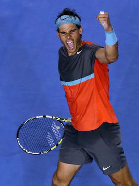 Nadal celebra sua vitória contra Federer.