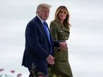 U.S. first lady Melania Trump walks holding hands with U.S President Donald Trump as they depart down the West Wing colonnade after she delivered her live address to the largely virtual 2020 Republican National Convention from the Rose Garden of the White House in Washington, U.S., August 25, 2020. REUTERS/Kevin Lamarque