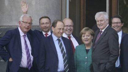 Políticos com o chanceler Angela Merkel