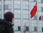 BERLIN, GERMANY - DECEMBER 11:  A woman walks past the Chinese Embassy on December 11, 2017 in Berlin, Germany. Hans-Georg Maassen, the head of the German intelligence service, the BvG (Bundesamt fuer Verfassungsschutz), has accused China of seeking to spy on German politicians and institutions by setting up fake accounts on LinkedIn and other social media for recruitment purposes.  (Photo by Sean Gallup/Getty Images)