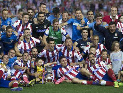 O Atlético comemora o título.