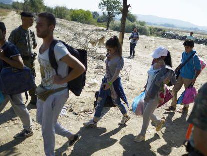 Imigrantes na fronteira entre Macedônia e Grécia em 28 de agosto.