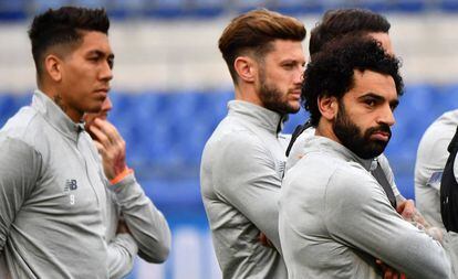 Os jogadores do Liverpool se preparam para o jogo contra a Roma.