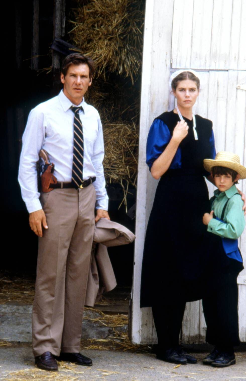 Com Harrison Ford e Lukas Haas em ‘A Testemunha’, seu primeiro grande papel, que lhe valeu críticas entusiasmadas em 1985.