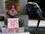 A picture taken on August 3, 2020 shows a bust of former king Leopold II covered in red paint, with "BLM" spray-painted on its base, in the park of the Africa Museum in Tervuren, near Brussels. - The bust of former Belgian king Leopold II, a controversial figure from Belgium's colonial past, has again been damaged in the grounds of the Africa Museum. The statue, which had already been painted in June, is regularly defaced. (Photo by François WALSCHAERTS / AFP)