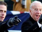 FILE PHOTO: U.S. Vice President Joe Biden (R) points to some faces in the crowd with his son Hunter as they walk down Pennsylvania Avenue following the inauguration ceremony of President Barack Obama in Washington, January 20, 2009. REUTERS/Carlos Barria/File Photo