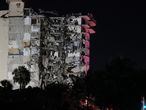 SURFSIDE, FLORIDA - JUNE 24: A portion of the 12-story condo tower crumbled to the ground during a partial collapse of the building on June 24, 2021 in Surfside, Florida. It is unknown at this time how many people were injured as search-and-rescue effort continues with rescue crews from across Miami-Dade and Broward counties.   Joe Raedle/Getty Images/AFP
== FOR NEWSPAPERS, INTERNET, TELCOS & TELEVISION USE ONLY ==