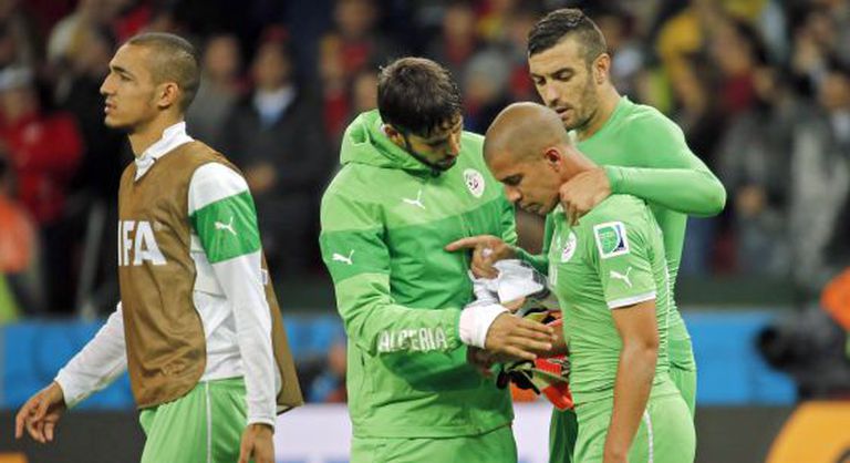 Os jogadores da Argélia depois da derrota para a Alemanha.