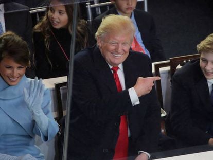 Barron Trump com os pais, Donald e Melania Trump.