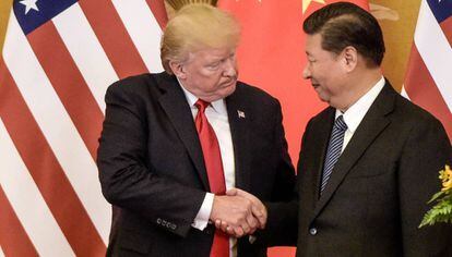 Trump, à esquerda, com o líder chinês, Xi Jinping, em novembro em Pequim.