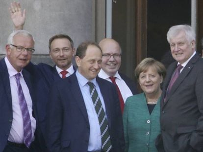 Políticos com o chanceler Angela Merkel