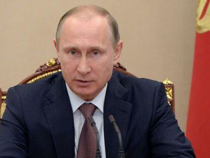 Vladimir Putin durante uma sessão do Kremlin