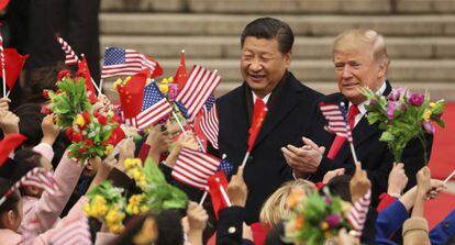 Donald Trump e Xi Jinping em novembro passado, em Pequim.