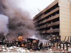 Nairobi (Kenya), 07/08/1998.- (FILE) - Firemen in action at the site of a huge bomb explosion that shook a bank building and US embassy in central Nairobi, Kenya, 07 August 1998 (reissued 14 November 2020). According to media reports citing intelligence officials, the second highest leader of the terror network al-Qaeda, who is said to be responsible for the bombings of the United States Embassies in Dar es Salaam, Tanzania, and Nairobi in 1998, was allegedly killed in Iran in August 2020. Abdullah Ahmed Abdullah, who was also known as Abu Mohamed Al-Masri, was shot by two men on a motorcycle in Tehran, a New York Times report claims. Iran denies the allegations. (Incendio, Kenia, Estados Unidos, Nueva York, Teherán) EFE/EPA/STR *** Local Caption *** 99425091