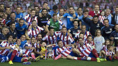 O Atlético comemora o título.