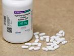 (FILES) This file photograph taken on May 20, 2020, shows a bottle and pills of Hydroxychloroquine as they sit on a counter at Rock Canyon Pharmacy in Provo, Utah. - The United States has delivered two million doses of the antimalarial drug hydroxychloroquine (HCQ) to Brazil to fight COVID-19, the White House said on May 31, 2020, though the drug has not yet been proven effective against the coronavirus. (Photo by GEORGE FREY / AFP)