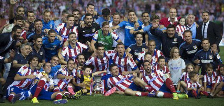 O Atlético comemora o título.