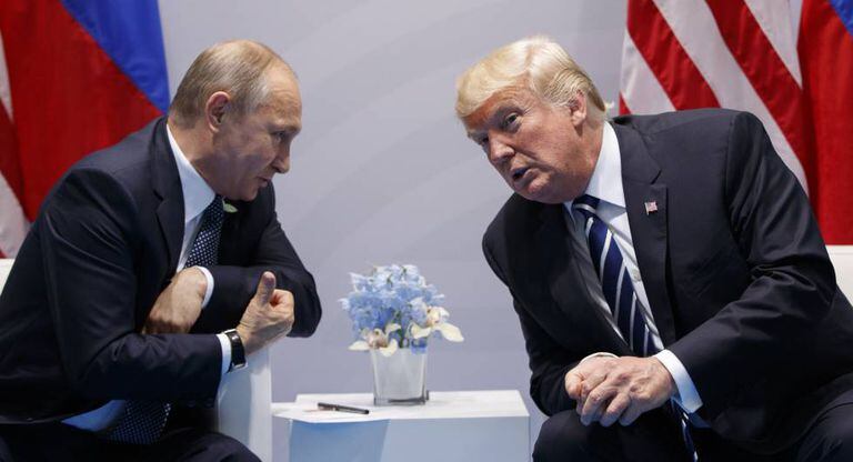 Donald Trump e Vladimir Putin, na reunião do G20.